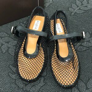 Alaia Black and Brown Flats